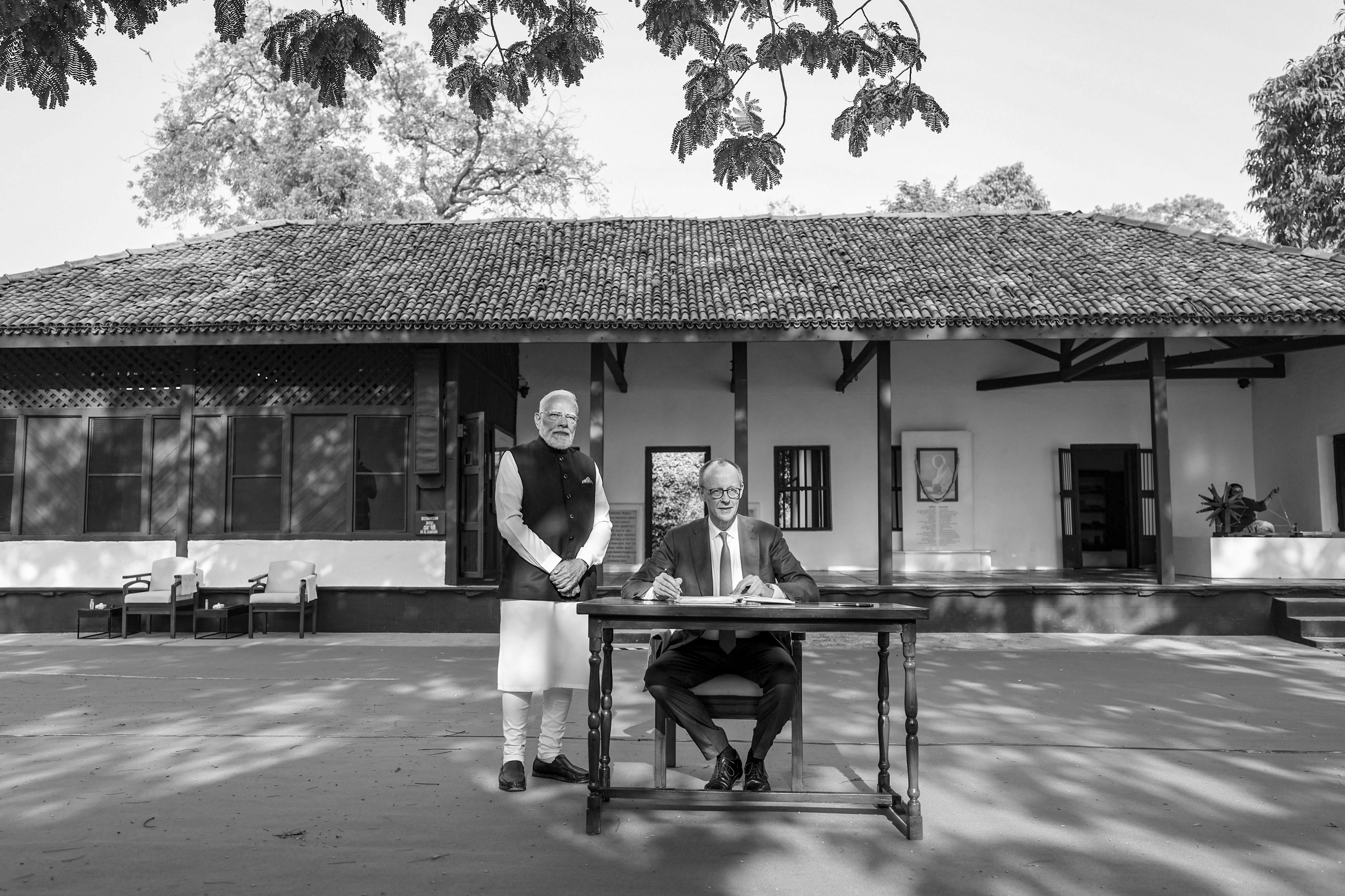 A month after erasing Gandhi from MGNREGA, Modi takes Merz to Gandhi's Sabarmati
