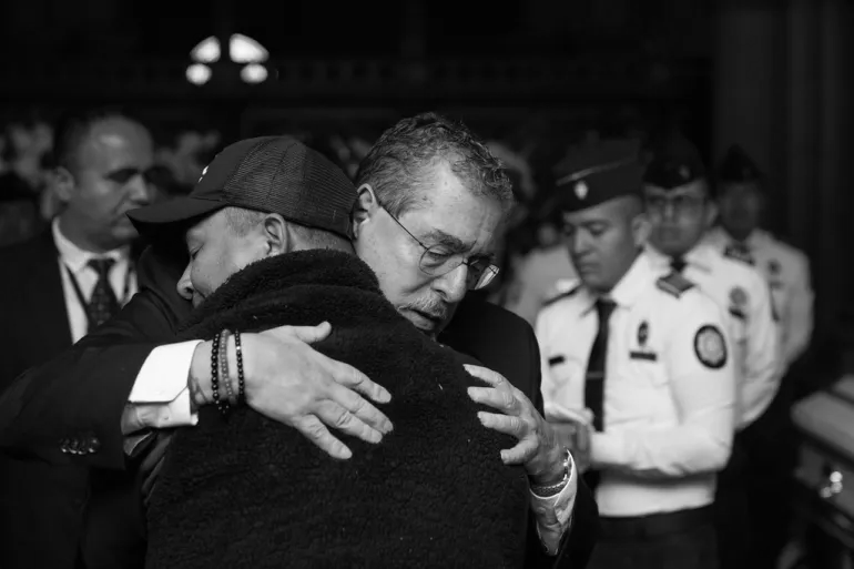 Guatemala mourns 10 police officers as state of emergency continues after gang attacks