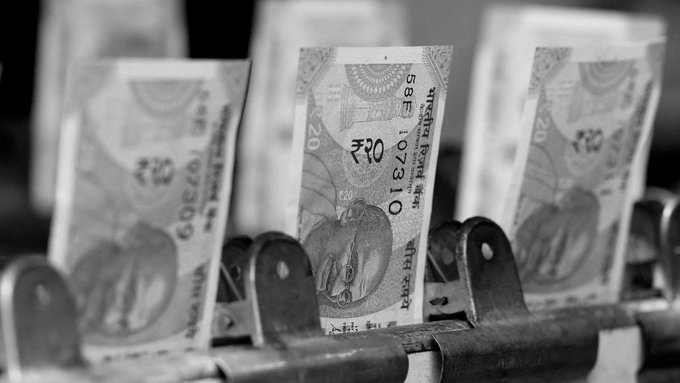 Rupee slips 19 paise to 93.10 against US dollar amid rising market volatility