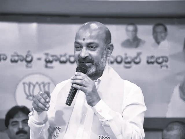 Bandi Sanjay Questions Photos of CM, Minister on Telangana Ration Cards