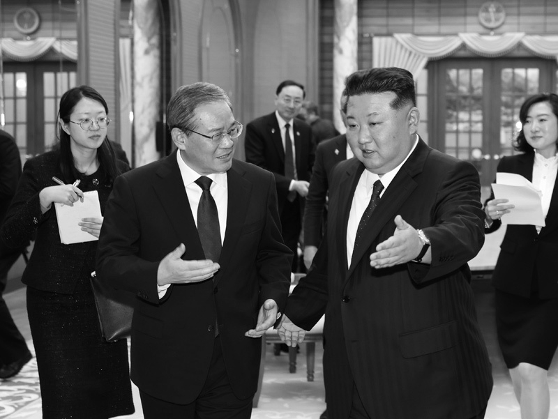 Kim Jong Un Visits China After New Yalu River Bridge Opens, Meets Li Qiang